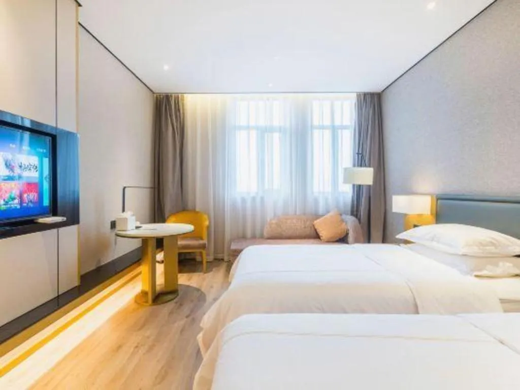 Bed in The Hotel V Nanjing Lishui