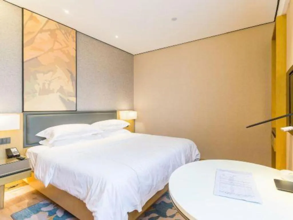 Bed in The Hotel V Nanjing Lishui