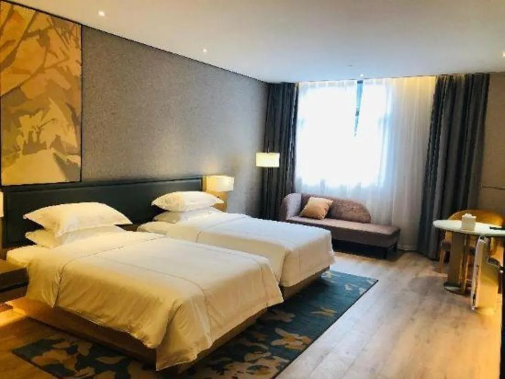 Bed in The Hotel V Nanjing Lishui