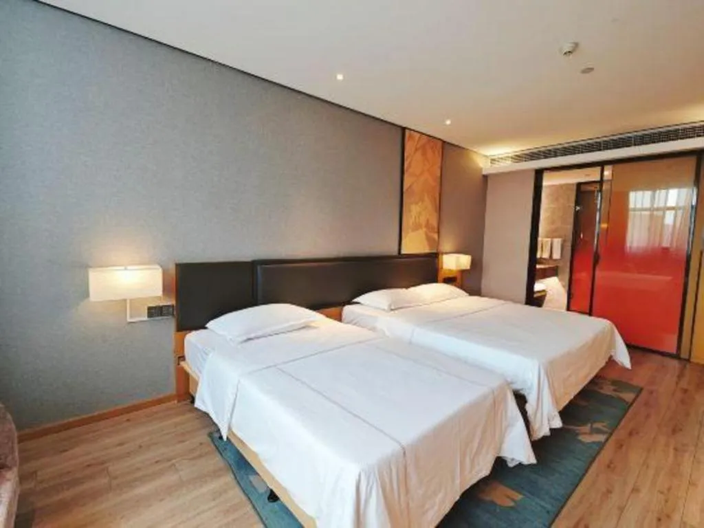 Bed in The Hotel V Nanjing Lishui