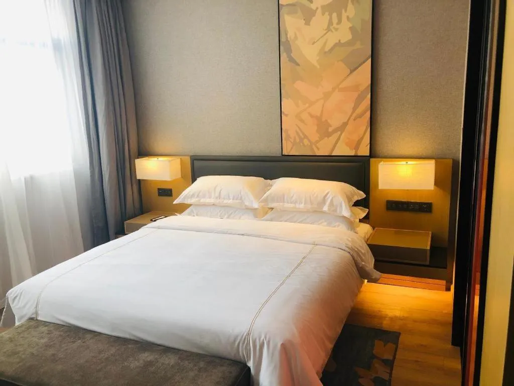 Bed in The Hotel V Nanjing Lishui