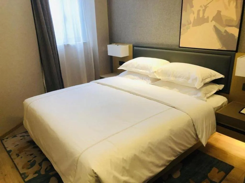 Bed in The Hotel V Nanjing Lishui
