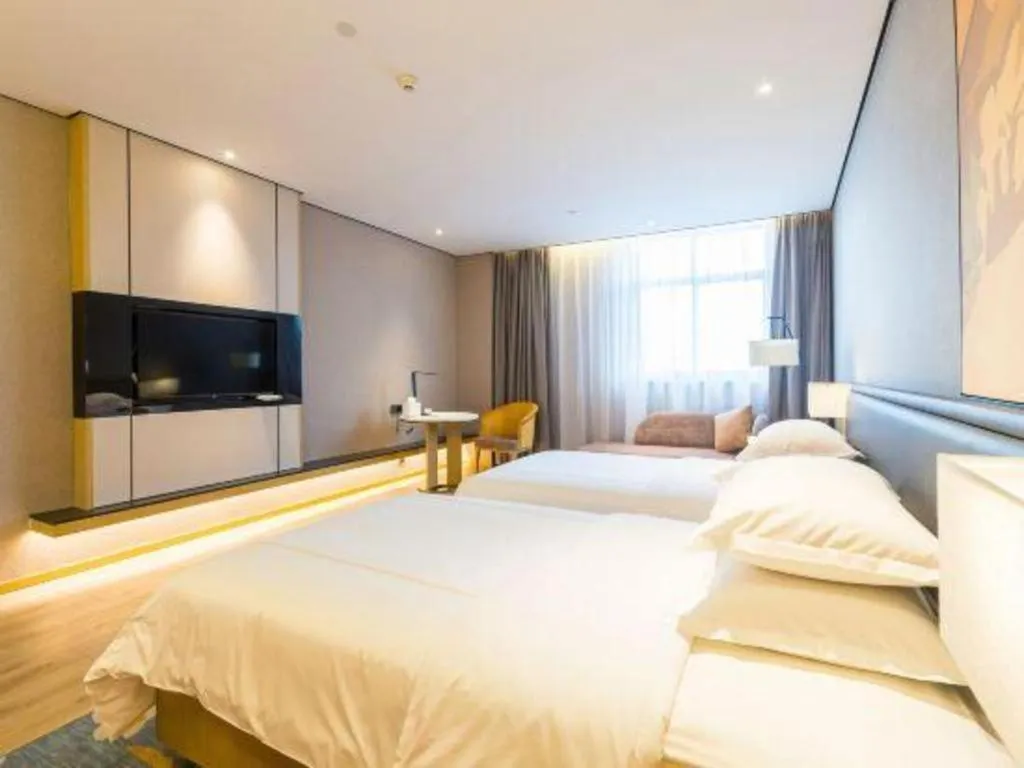 Bed in The Hotel V Nanjing Lishui