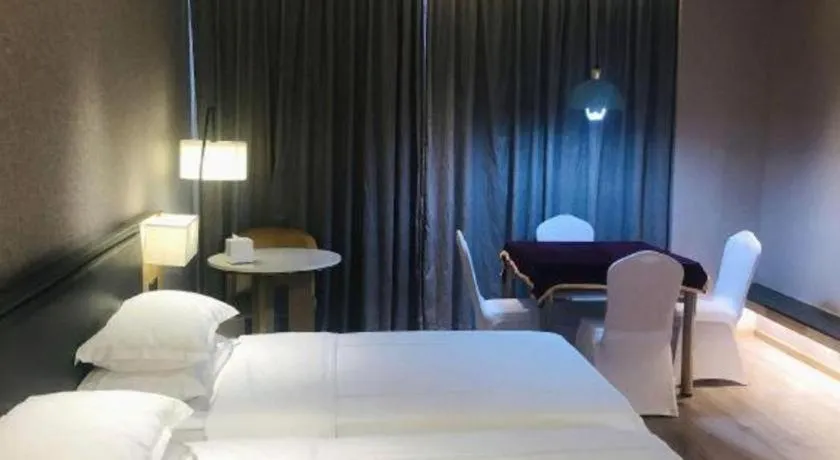 Bed in The Hotel V Nanjing Lishui