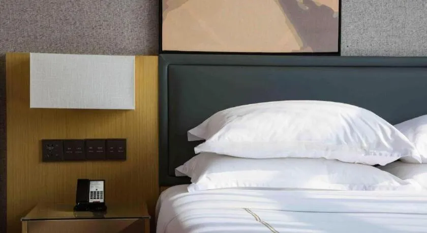 Bed in The Hotel V Nanjing Lishui