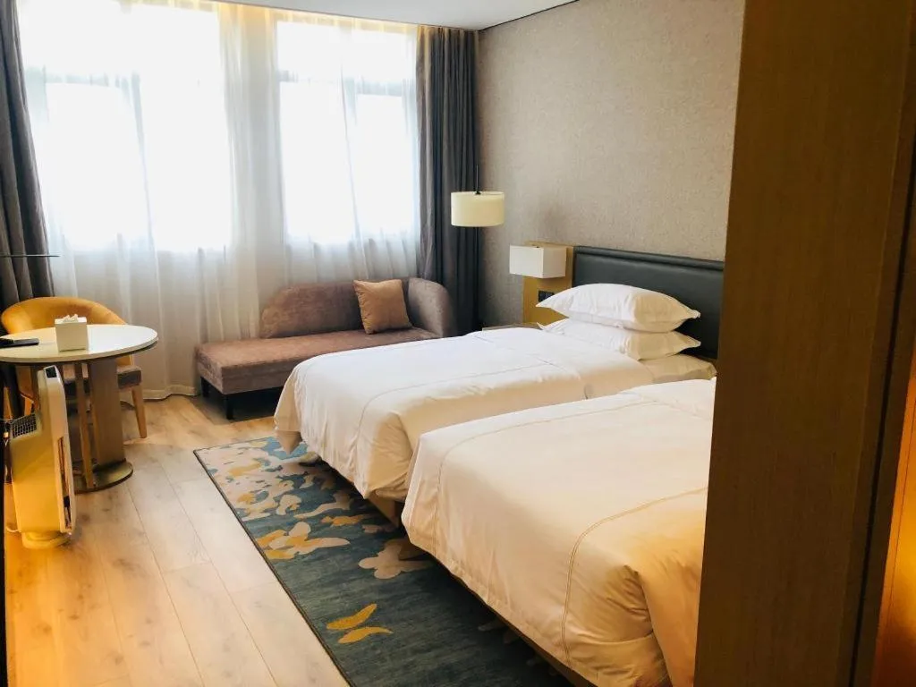 Bed in The Hotel V Nanjing Lishui