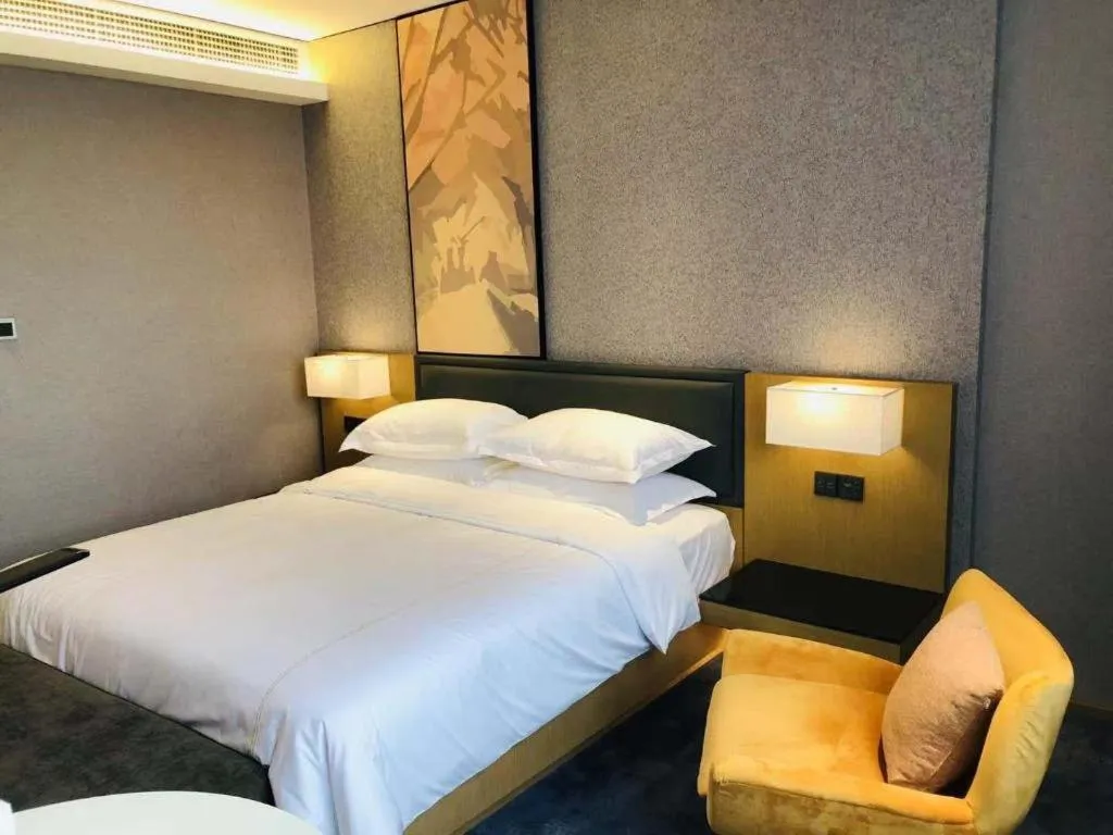 Bed in The Hotel V Nanjing Lishui