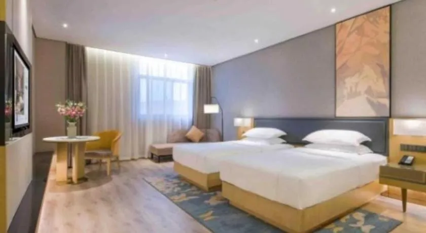 Bed in The Hotel V Nanjing Lishui