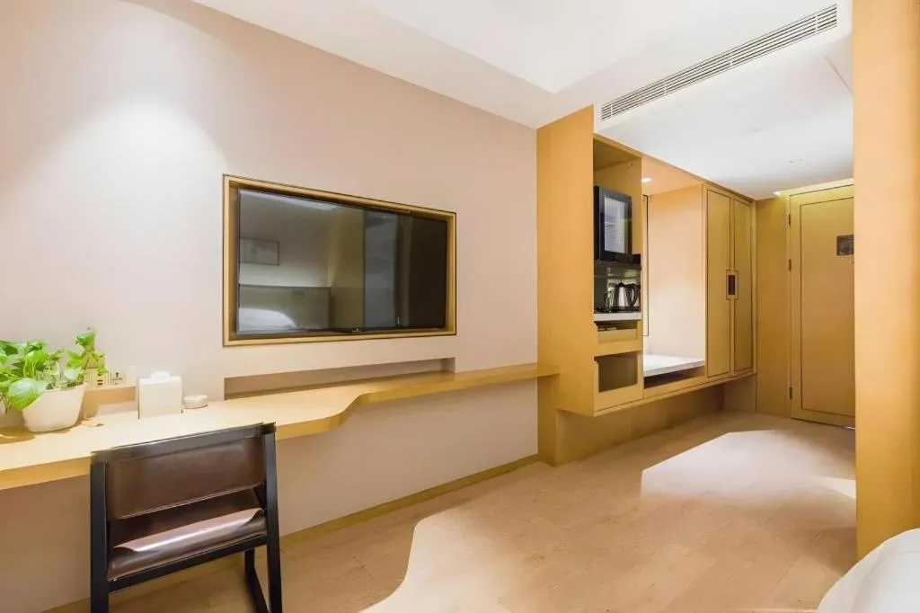 Bed in The Hotel V Nanjing Confucius Temple