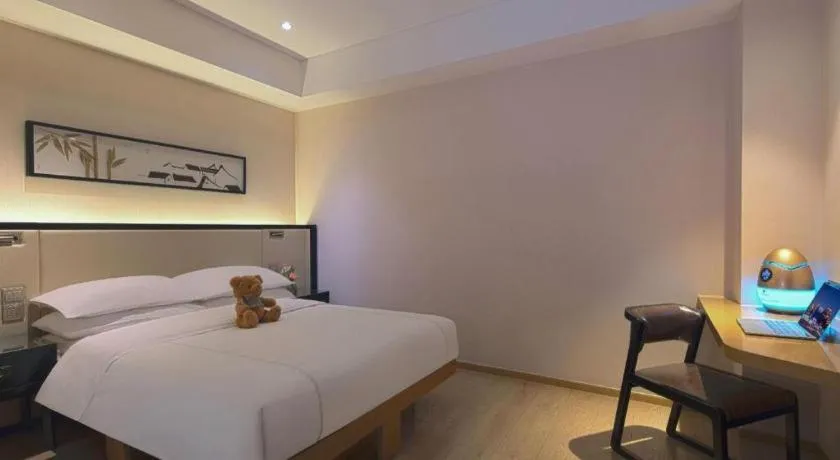 Bed in The Hotel V Nanjing Confucius Temple