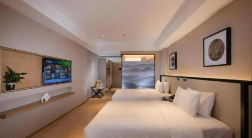 Bed in The Hotel V Nanjing Confucius Temple