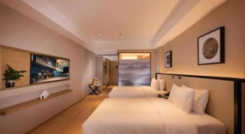 Bed in The Hotel V Nanjing Confucius Temple