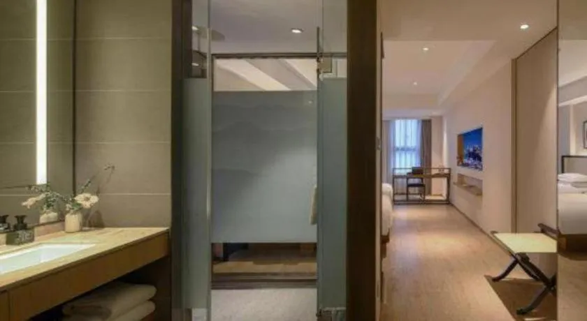 Bed in The Hotel V Nanjing Confucius Temple