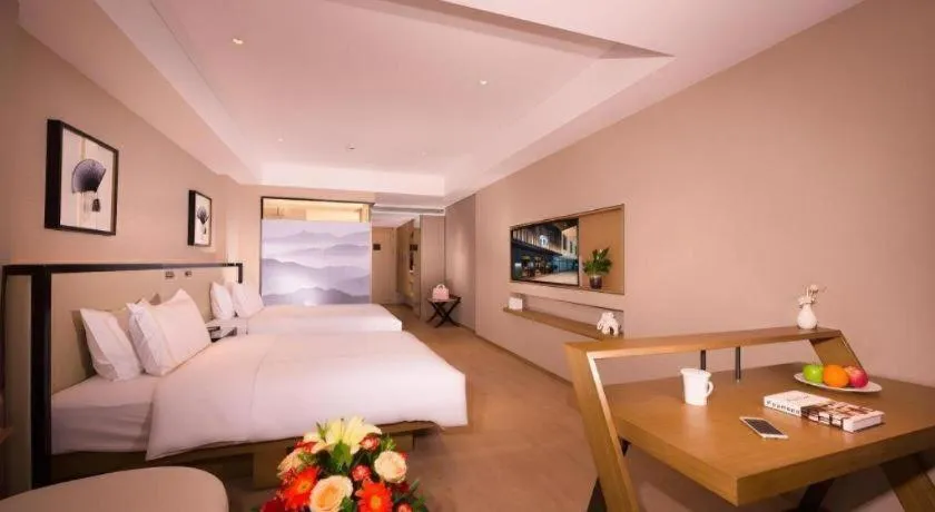 Bed in The Hotel V Nanjing Confucius Temple