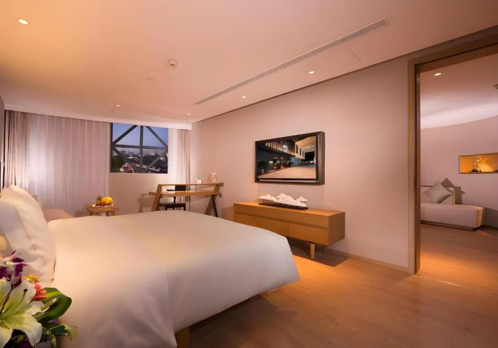 Bed in The Hotel V Nanjing Confucius Temple