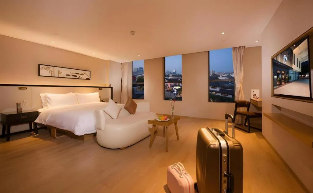 Bed in The Hotel V Nanjing Confucius Temple