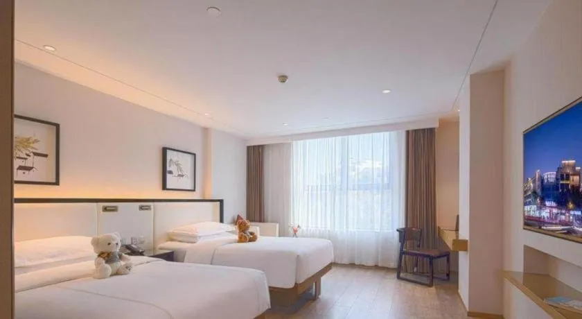 Bed in The Hotel V Nanjing Confucius Temple