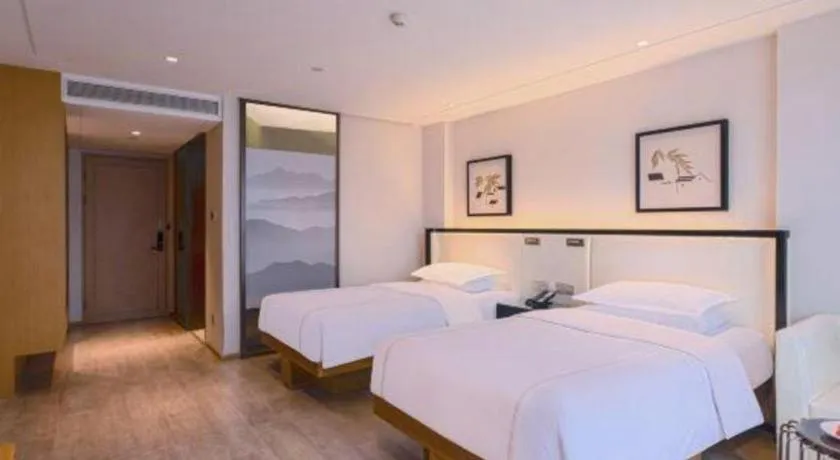 Bed in The Hotel V Nanjing Confucius Temple