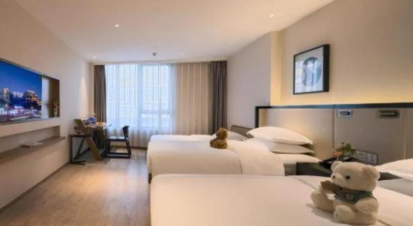 Bed in The Hotel V Nanjing Confucius Temple