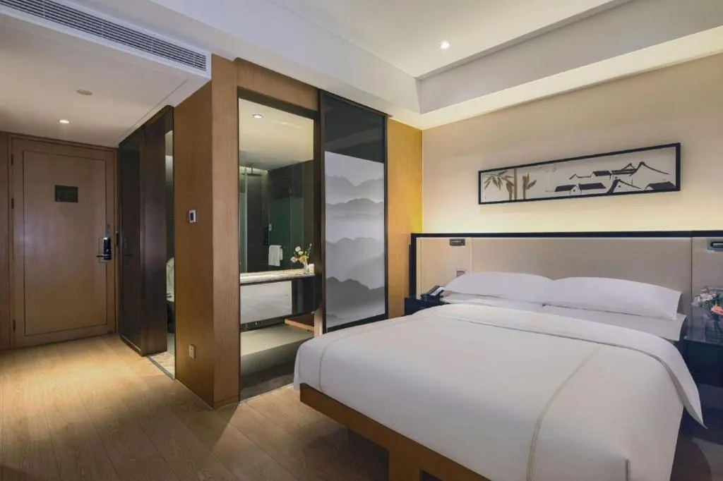 Bed in The Hotel V Nanjing Confucius Temple