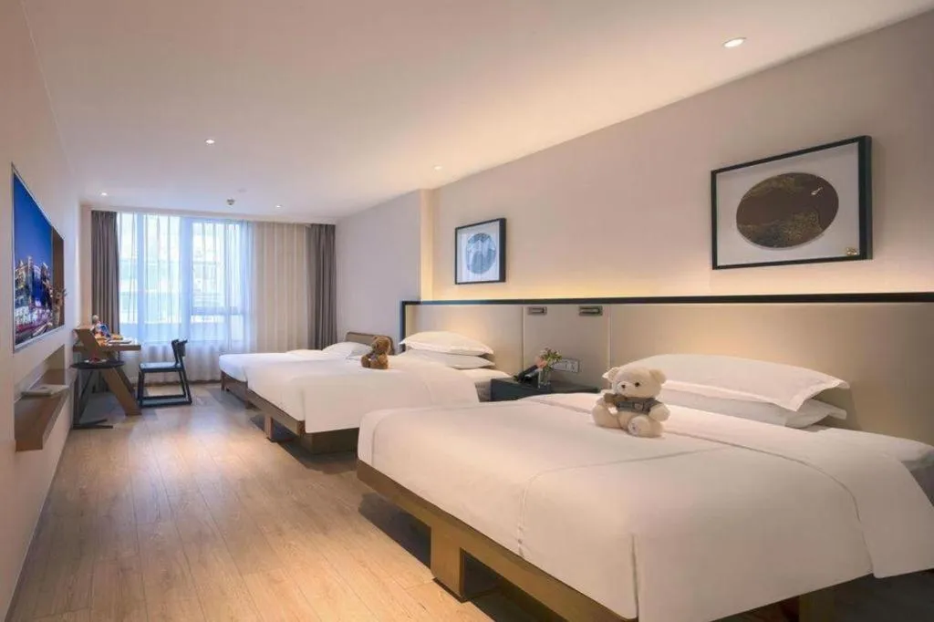 Bed in The Hotel V Nanjing Confucius Temple