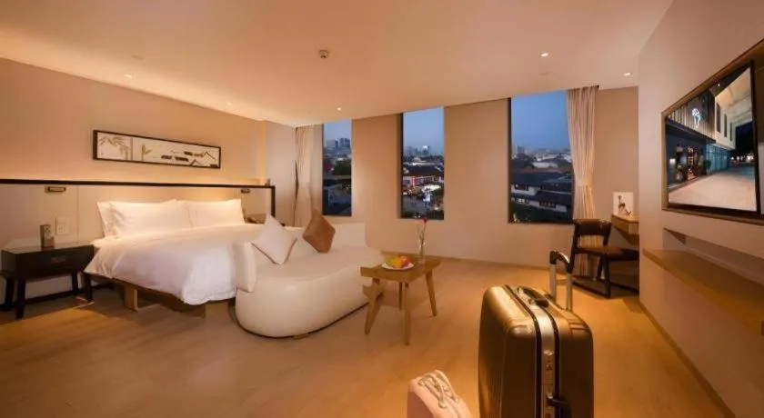 Bed in The Hotel V Nanjing Confucius Temple