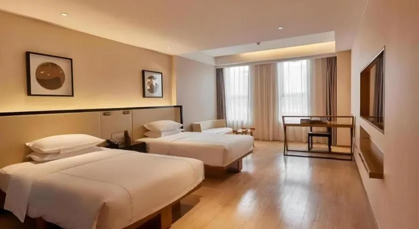 Bed in The Hotel V Nanjing Confucius Temple