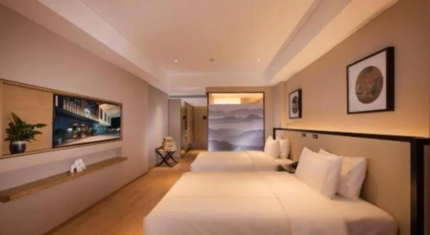 Bed in The Hotel V Nanjing Confucius Temple