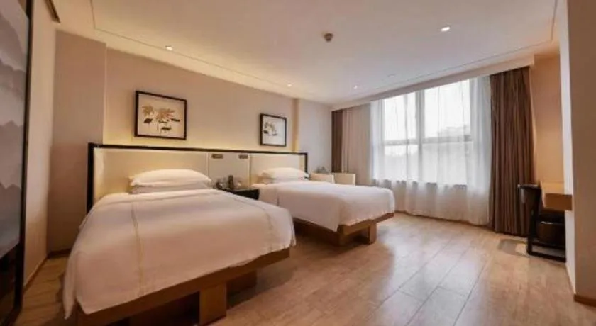 Bed in The Hotel V Nanjing Confucius Temple