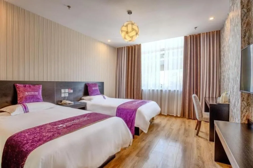 Bed in City 118 Hotel Qingdao Boardcast Tower