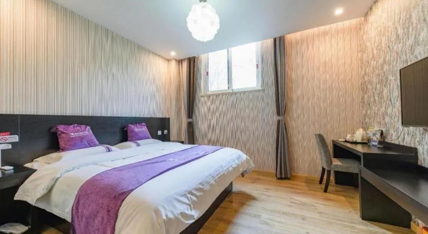 Bed in City 118 Hotel Qingdao Boardcast Tower