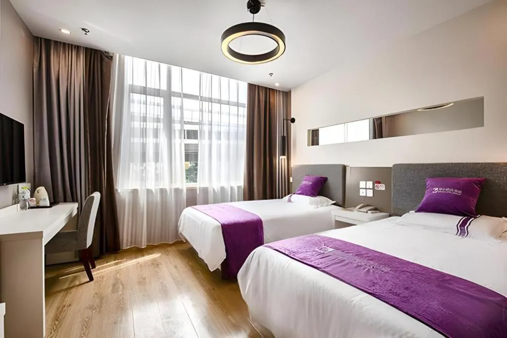 Bed in City 118 Hotel Qingdao Boardcast Tower