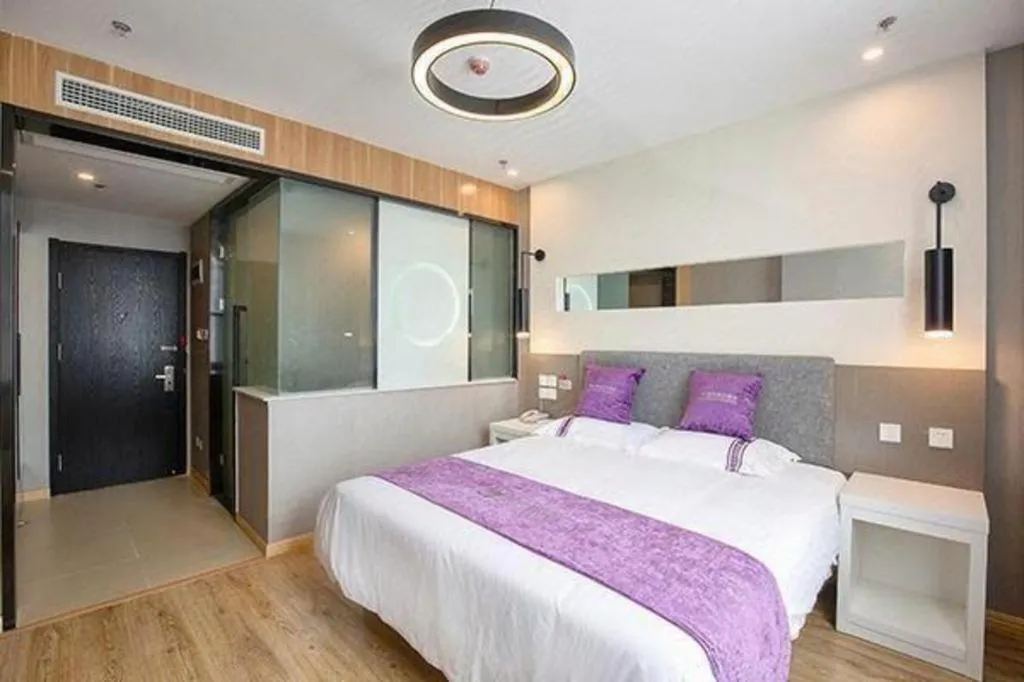 Bed in City 118 Hotel Qingdao Boardcast Tower