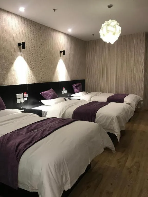 Bed in City 118 Hotel Qingdao Boardcast Tower