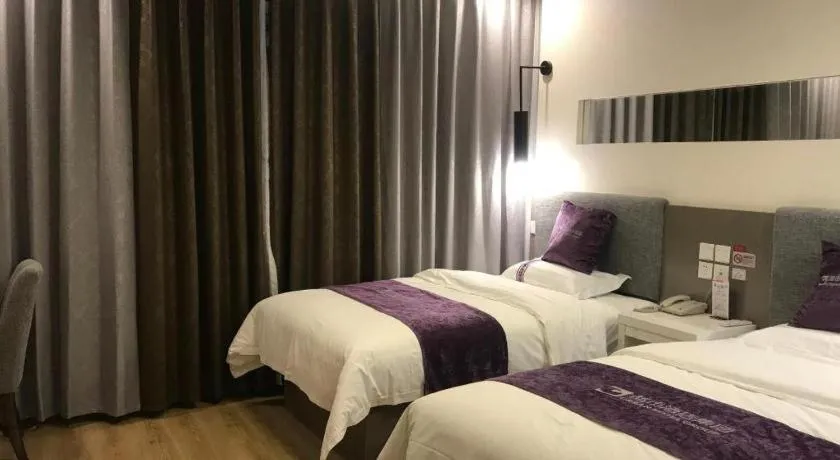 Bed in City 118 Hotel Qingdao Boardcast Tower