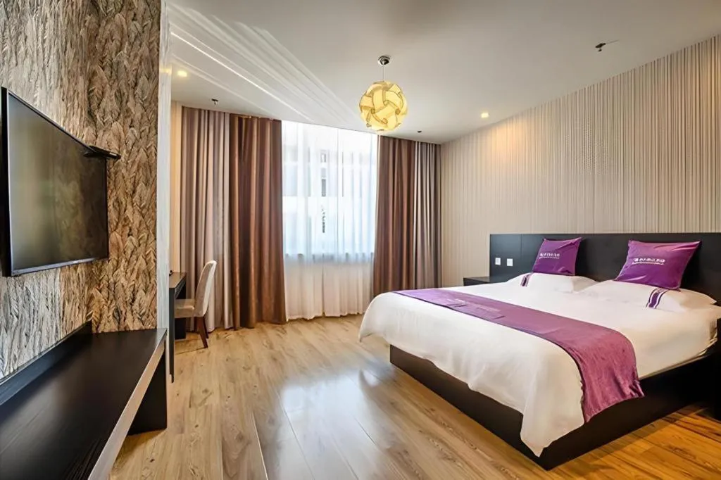 Bed in City 118 Hotel Qingdao Boardcast Tower