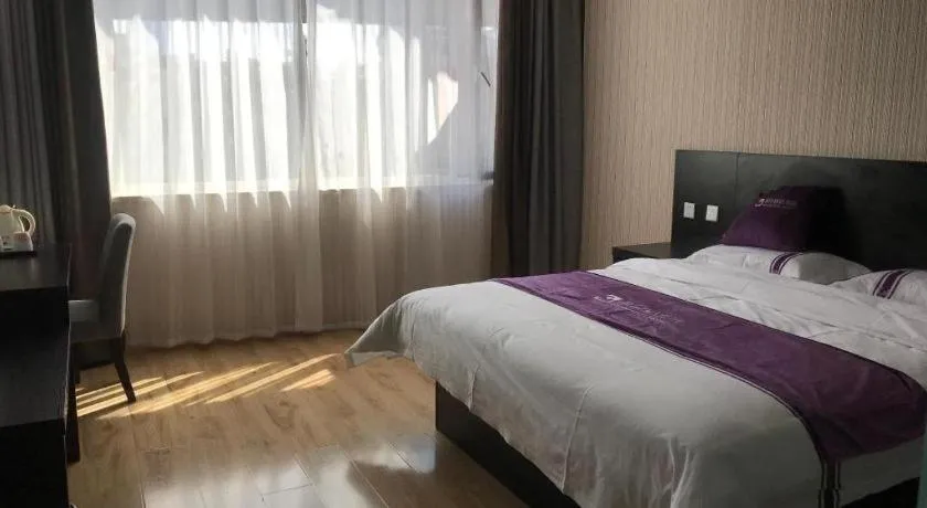Bed in City 118 Hotel Qingdao Boardcast Tower