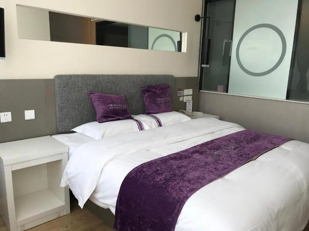 Bed in City 118 Hotel Qingdao Boardcast Tower