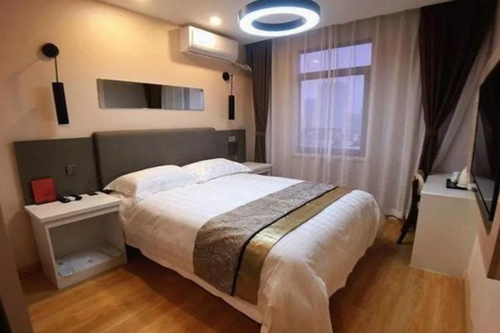 Bed in City 118 Hotel Qingdao Boardcast Tower