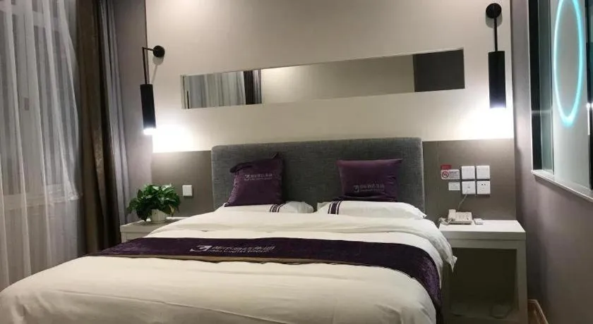Bed in City 118 Hotel Qingdao Boardcast Tower