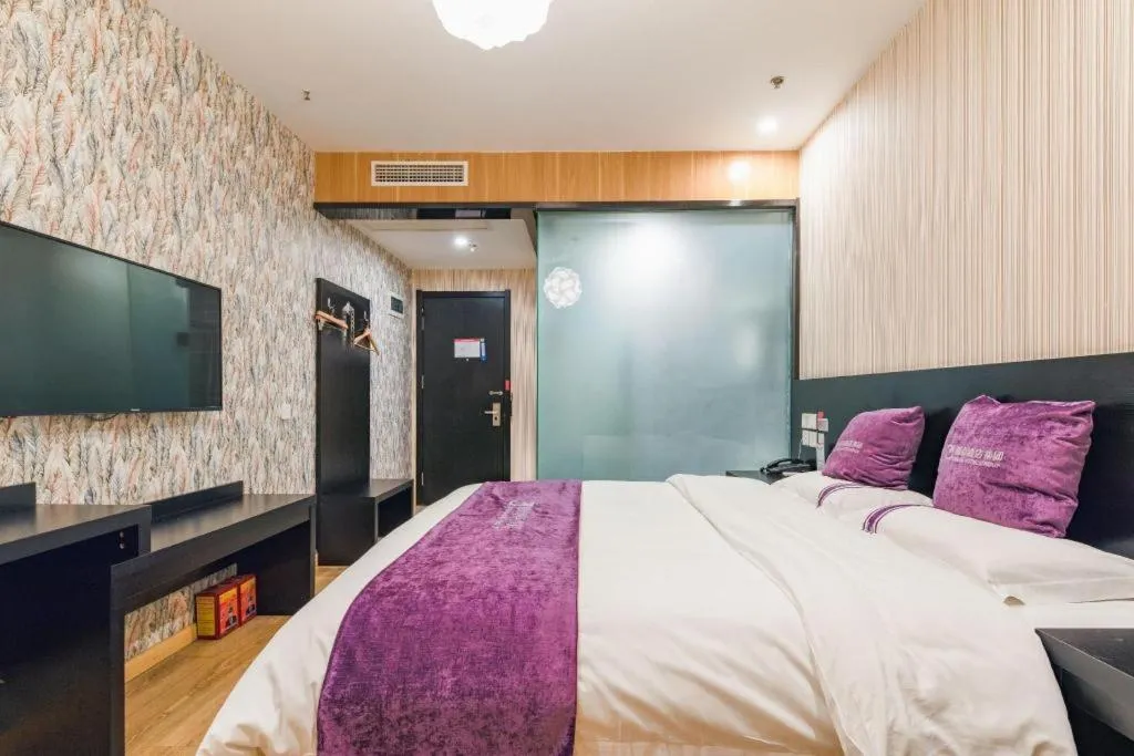 Bed in City 118 Hotel Qingdao Boardcast Tower