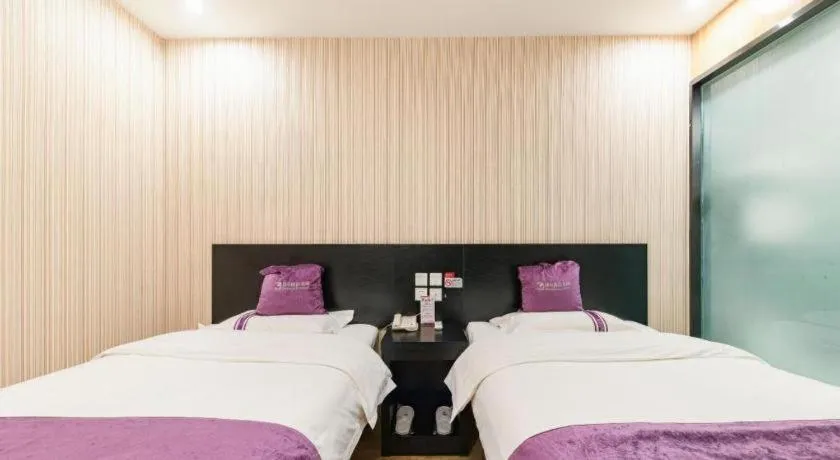 Bed in City 118 Hotel Qingdao Boardcast Tower