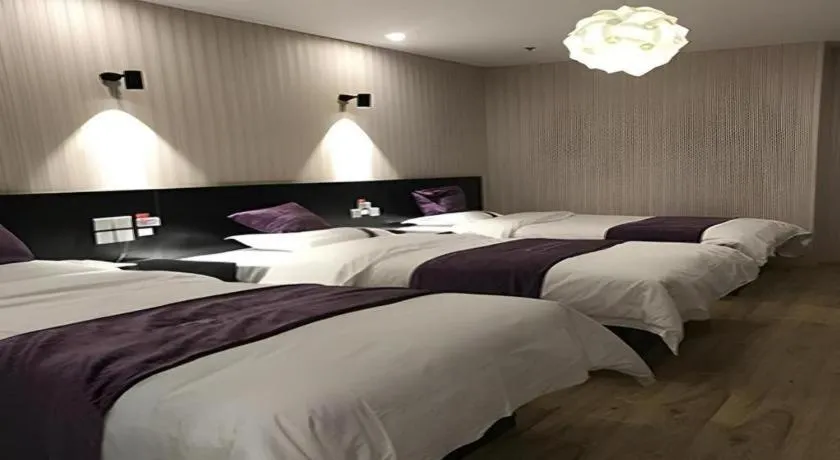 Bed in City 118 Hotel Qingdao Boardcast Tower