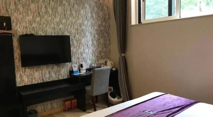 Bed in City 118 Hotel Qingdao Boardcast Tower