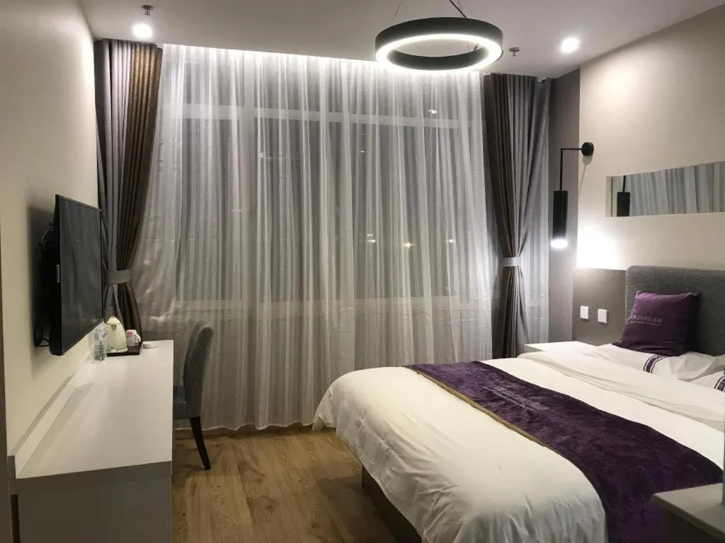 Bed in City 118 Hotel Qingdao Boardcast Tower