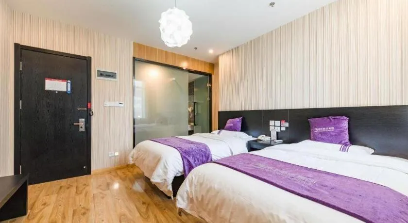 Bed in City 118 Hotel Qingdao Boardcast Tower