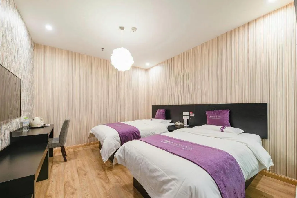 Bed in City 118 Hotel Qingdao Boardcast Tower