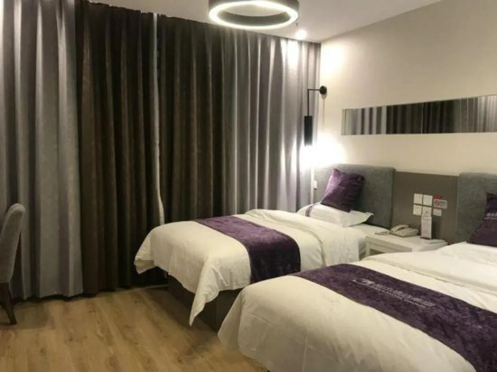 Bed in City 118 Hotel Qingdao Boardcast Tower