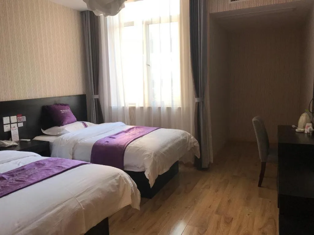 Bed in City 118 Hotel Qingdao Boardcast Tower