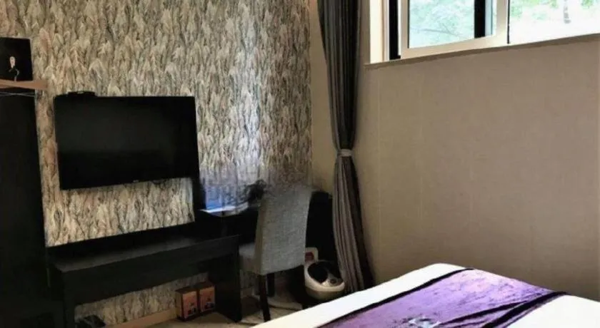 Bed in City 118 Hotel Qingdao Boardcast Tower